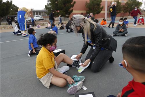 Jones brothers shoe giveaway at Hawkins Elementary 